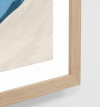 Close-up of Middle of Nowhere Mediterranean Alfresco Blue 6 painterly print framed in oak with white border