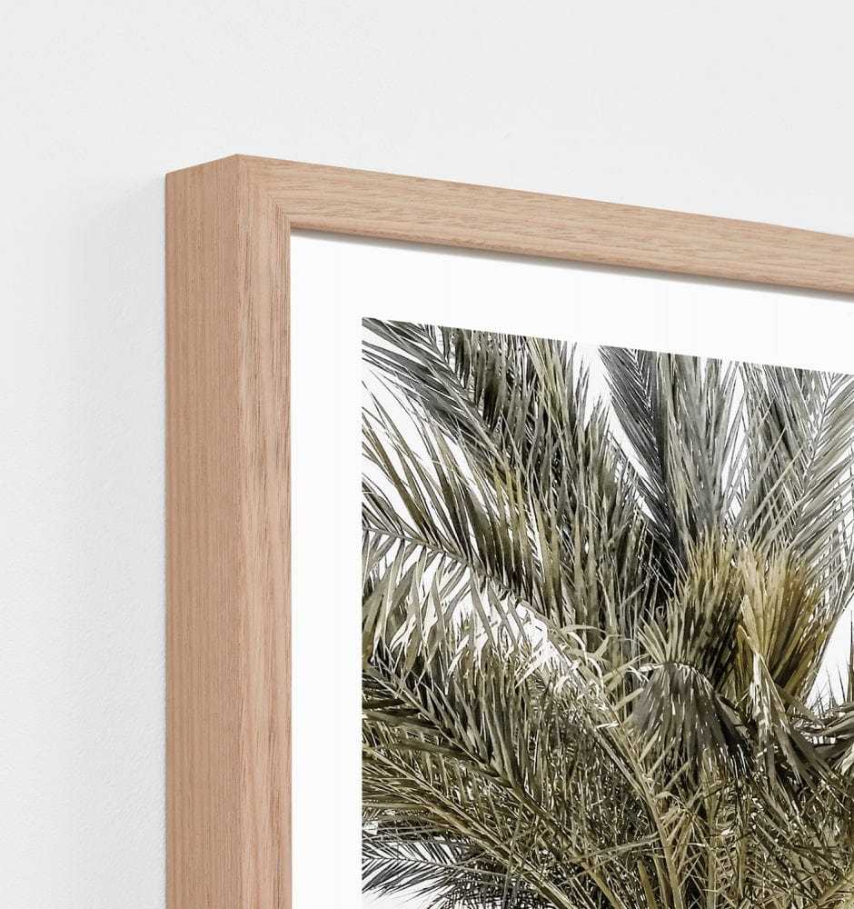 Close-up of Middle of Nowhere Mediterranean Balcony framed print with timber frame and white border from Middle of Nowhere Collection
