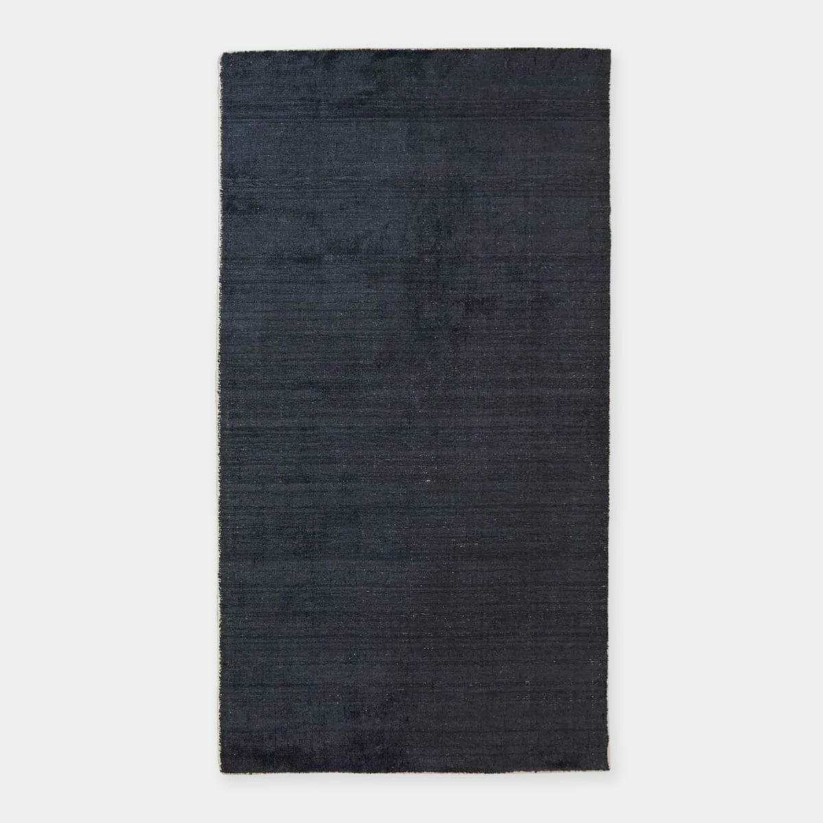 GlobeWest Tepih Neptune hand-woven midnight wool blend indoor rug with subtle rustic texture