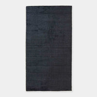 GlobeWest Tepih Neptune hand-woven midnight wool blend indoor rug with subtle rustic texture