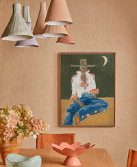 Marcia Priestley Chaps Star framed canvas print styled in a dining room