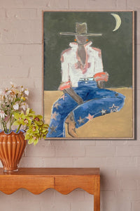 Marcia Priestley Chaps Star framed canvas print styled above a console