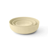 Set of beige Styleware nesting bowls in various sizes for versatile kitchen use