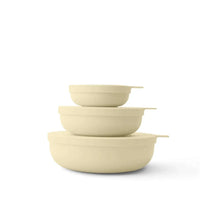 Set of three beige Styleware nesting bowls with snap-tight lids in sorbet color, BPA-free and stackable for compact storage