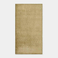 GlobeWest Bower Frame Rug in moss green, handwoven wool, versatile indoor area rug with simple silhouette