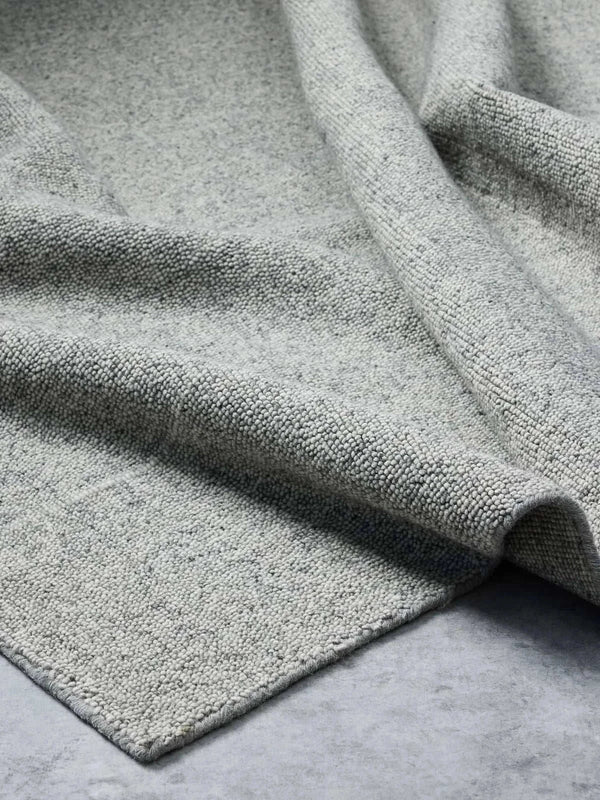 Blue grey Noble Rug with handloomed wool texture and subtle elegant design