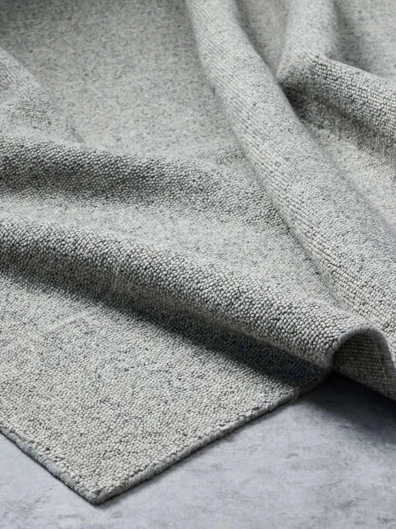 Blue grey Noble Rug with handloomed wool texture and subtle elegant design