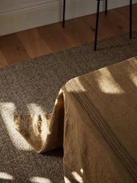 Noble Rug dark beige hand-loomed wool rug with subtle texture and durable design