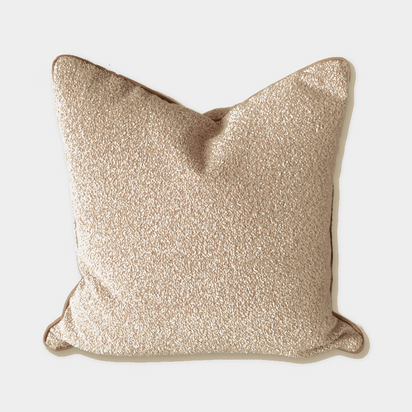 norsu Studio Cushion Boucle Buff with White Leather Piping square cushion front view