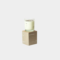 Grace and James Baja scented candle with basil, grapefruit, and cucumber fragrance in soy wax container