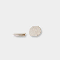 CoTheory Anchor Stone Coasters beige travertine set protecting surfaces with elegant design