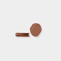 CoTheory Anchor Stone Coasters in Rosso Alicante protecting surfaces with stable, stylish stone design, set of four