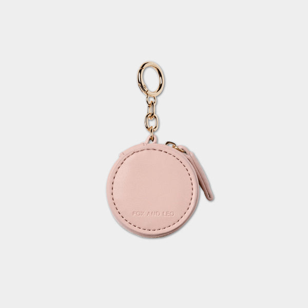 Fox and Leo blush leather bag charm with gold hardware and microfibre cleaning cloth