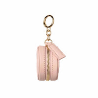 Fox and Leo blush leather bag charm with gold hardware and microfiber cleaning cloth