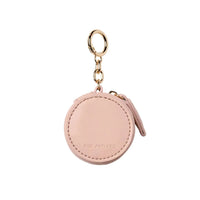 Fox and Leo blush leather bag charm with gold hardware and microfibre cleaning cloth