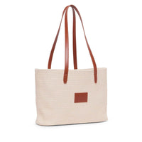 Base Supply Panier tan woven straw tote bag with leather straps and cotton lining