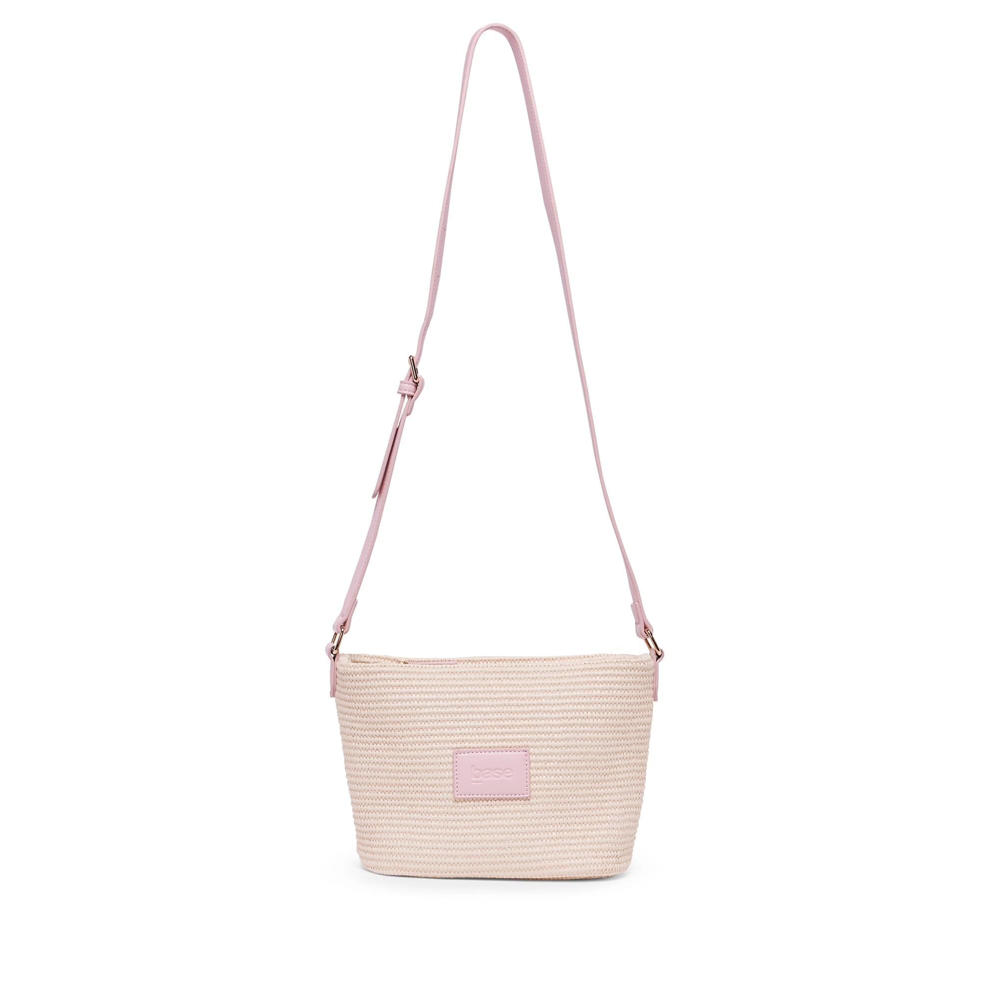 Base Supply Panier Crossbody bag in pink woven straw with adjustable strap and zip-top closure