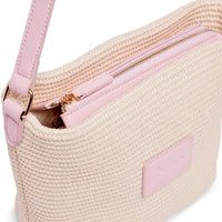 Base Supply Panier Crossbody bag in pink woven straw with adjustable strap and zip-top closure