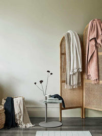 Paros Bath Mat in limestone color made from sustainable cotton with hand-knotted fringes and OEKO-TEX® certification.