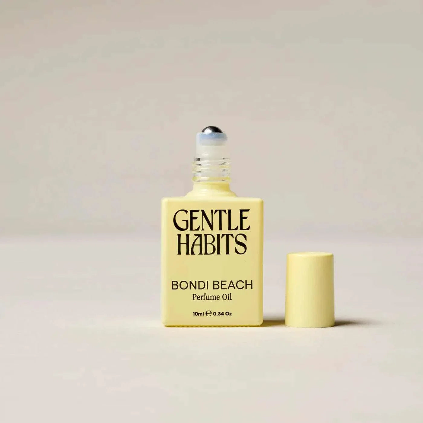 Gentle Habits Roll-On Perfume Oil Bondi Beach in refillable bottle with grapefruit and cedarwood scent