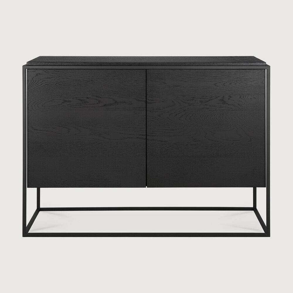 Ethnicraft Oak Monolit black tainted solid oak sideboard with two doors and black metal frame.