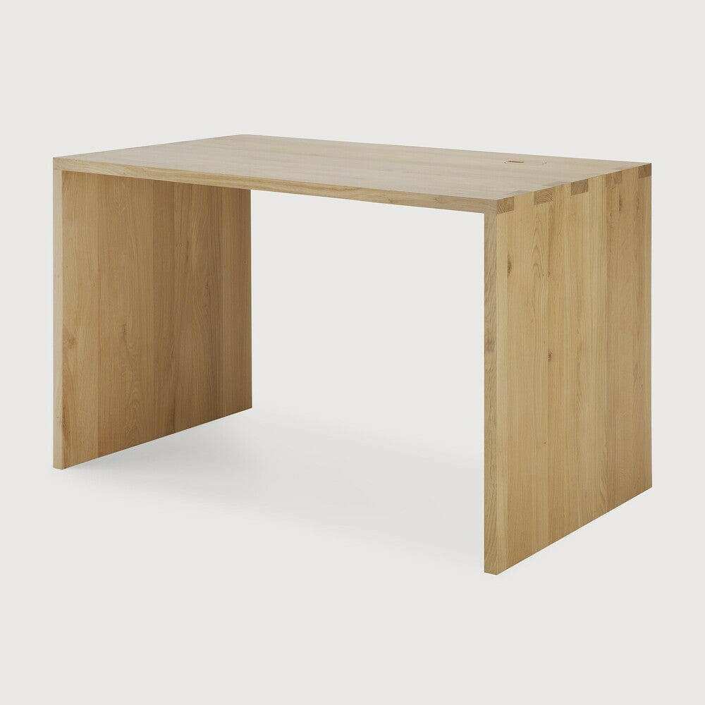 Ethnicraft U Desk in natural oak with simple, sturdy design and cable management features