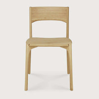 Ethnicraft PI Dining Chair in natural oak with sleek, handcrafted wooden design and curved backrest.