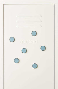 Set of six Ocean blue round magnets from Mustard Made with smooth flat surface and strong magnetic back on white packaging.
