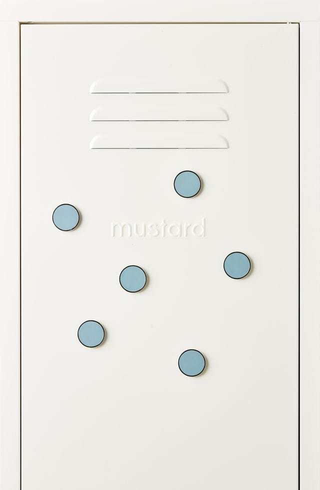 Set of six Ocean blue round magnets from Mustard Made with smooth flat surface and strong magnetic back on white packaging.