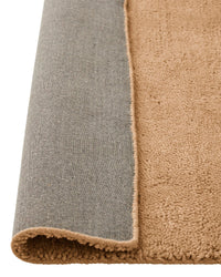 Plush chunky camel Valencia Rug made from 100% wool with rich texture and warm golden tone
