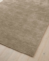 Plush chunky wool Valencia Rug in latte beige color showcasing textured weave and soft pile