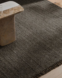 Weave Puglia Rug pigeon chunky handwoven textured brown rug with fringe in living room