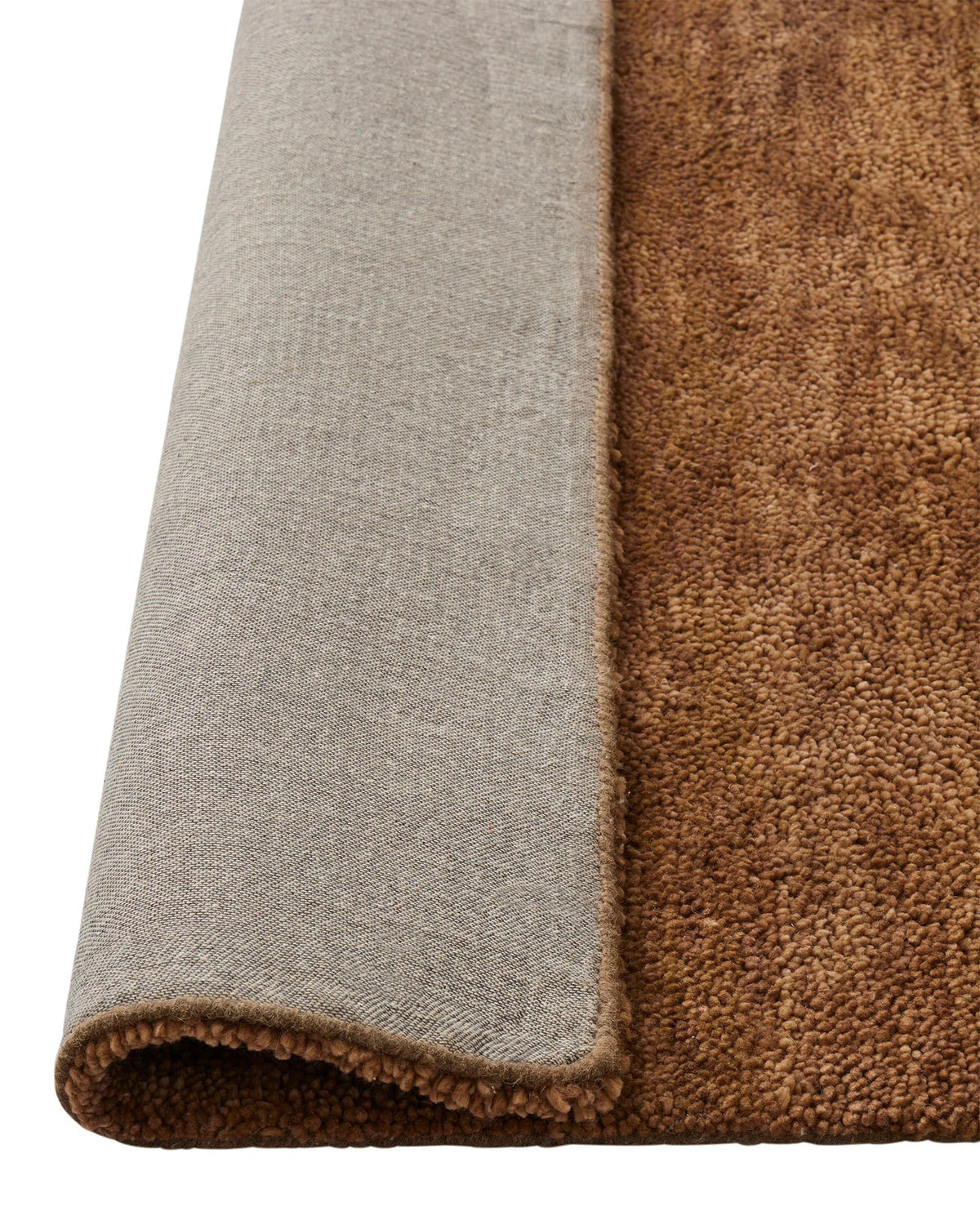 Plush chunky wool Weave Valencia Rug in Toffee brown with rich texture and soft dense feel underfoot