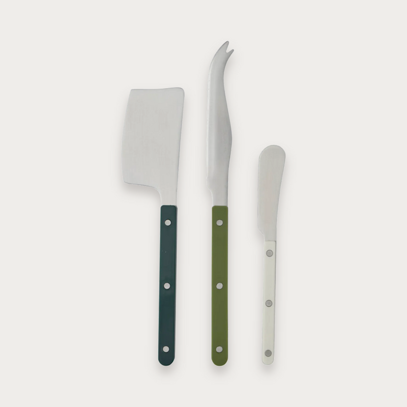 Remy three-piece cheese knife set with green handles on a soft grey background