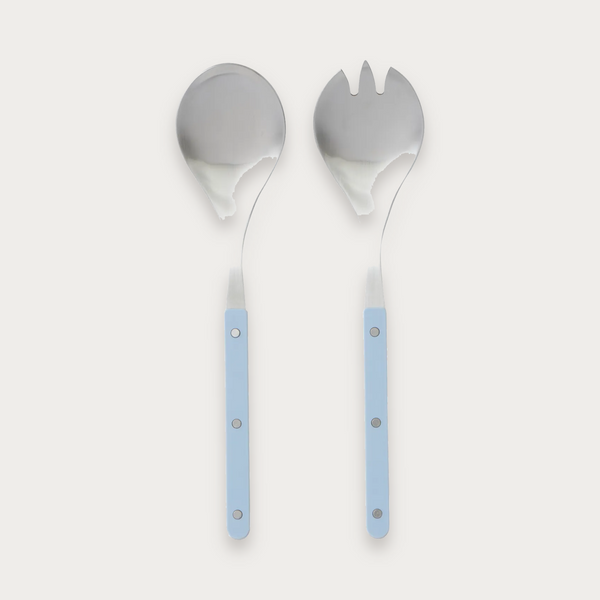 Remy salad servers with denim handles on a soft grey background