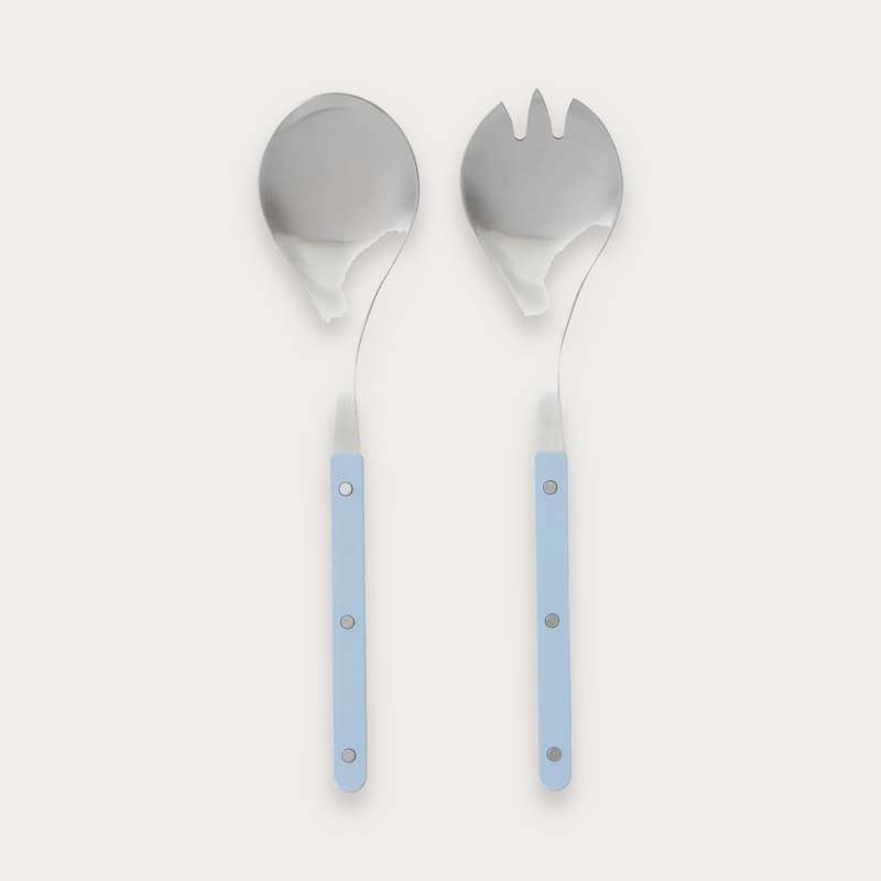 Remy salad servers with denim handles on a soft grey background