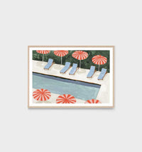Middle of Nowhere Resort pool print with pink umbrellas and blue lounge chairs framed with a white border