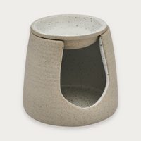 Robert Gordon Garden to Table oil burner in natural on a soft grey background