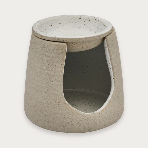 Robert Gordon Garden to Table oil burner in natural on a soft grey background