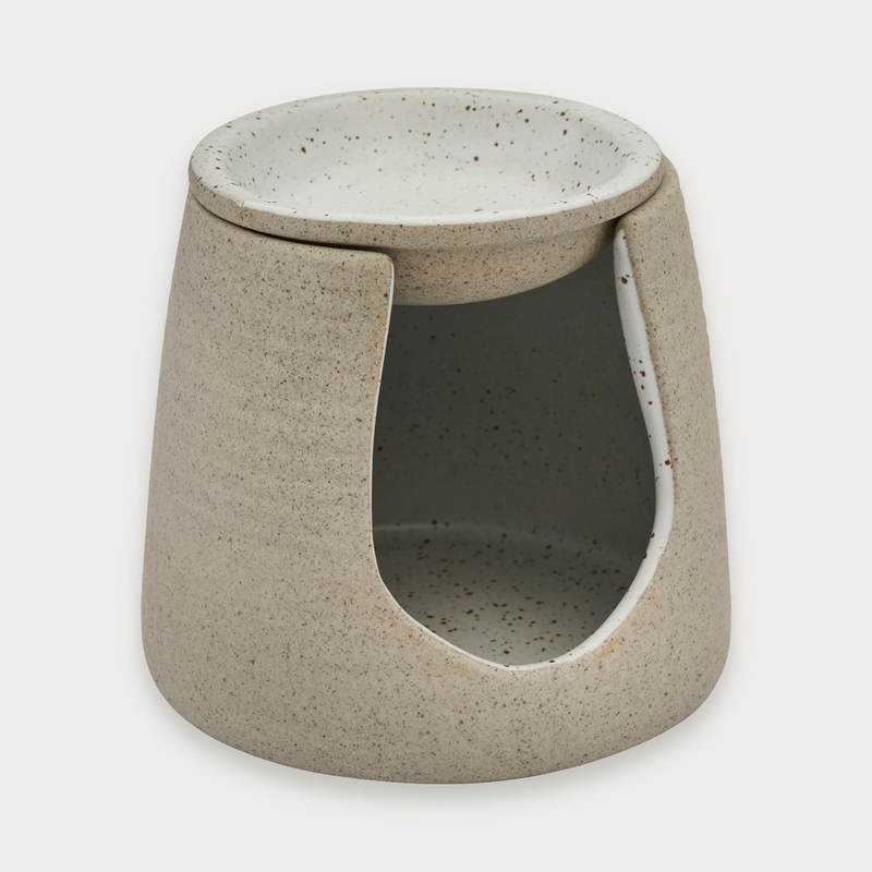 Robert Gordon Garden to Table oil burner in natural on a soft grey background