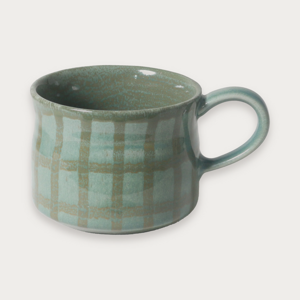 Robert Gordon Tapestry mug in Frankie green on a soft grey background