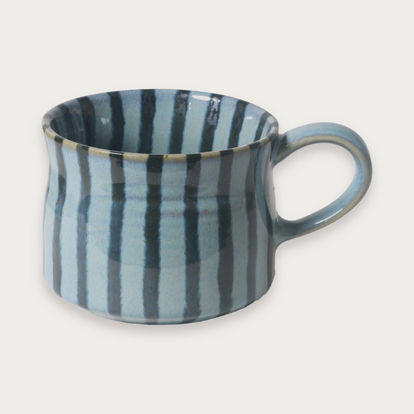 Robert Gordon Tapestry mug in Jude blue on a soft grey background