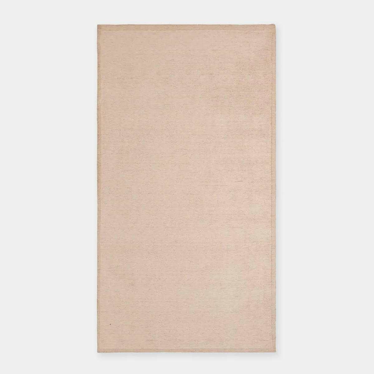 GlobeWest Bower Frame Rug in rose, hand-woven 100% wool indoor rug with a simple silhouette.