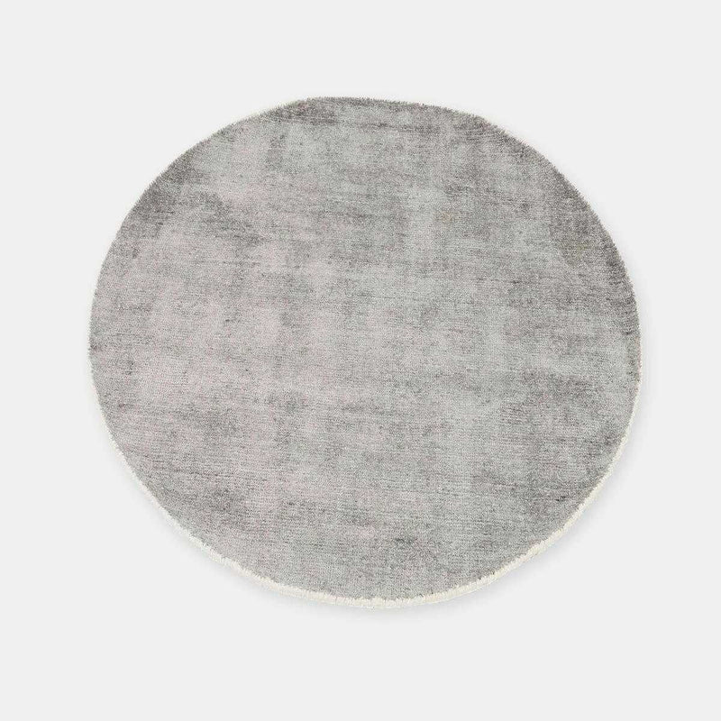 GlobeWest Tepih Neptune round dove grey hand-woven wool, silk, and cotton rug for indoor use