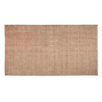 GlobeWest Tepih Neptune Rug in dusty rose, hand-woven wool blend floor rug with subtle texture.