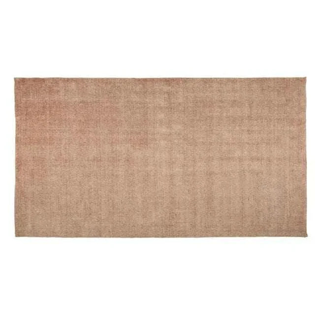 GlobeWest Tepih Neptune Rug in dusty rose, hand-woven wool blend floor rug with subtle texture.