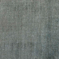 GlobeWest Tepih Neptune Rug - Ocean Green, styled in a room setting