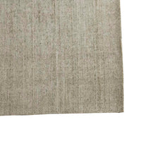 GlobeWest Tepih Neptune Rug - Silver Grey, styled in a room setting