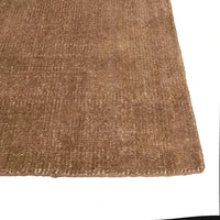 Close-up of Ginger GlobeWest Tepih Neptune Rug showing hand-woven wool, silk, and cotton texture