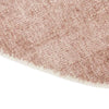 Close-up of GlobeWest Tepih Neptune round hand-woven indoor rug in dusty rose with wool, silk, and cotton blend texture